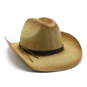Classic woven straw cowboy hat with a brown leather band and rolled brim on white background