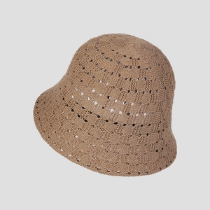 Close-up of the hollow knit pattern and breathable texture on the brown fisherman hat