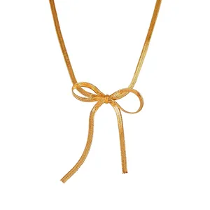 Collana a catena piatta a serpente dorata con fiocco e misure di dettaglio incluse