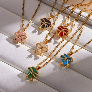 Elegant gold-plated heart crystal necklaces with bow accents in six vibrant colors