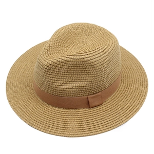 Classic straw Panama hat with a dark brown ribbon band, stylish sun protection fedora