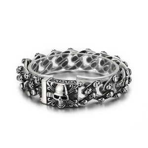 Punk style stainless steel double-row skull bracelet with silver polished finish