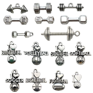 Detailed silver fitness and sports charms including dumbbells and various balls