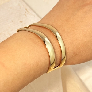 Minimalist wide gold-plated stainless steel open cuff bracelet with double layered lines