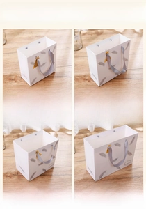 Detailed size chart for white feather paper gift bags with grey satin ribbon handles