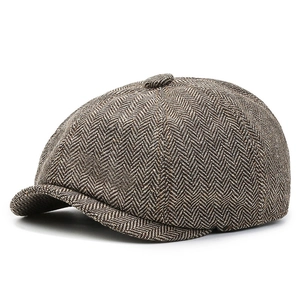 Classic coffee herringbone newsboy cap for men featuring a vintage wool blend texture