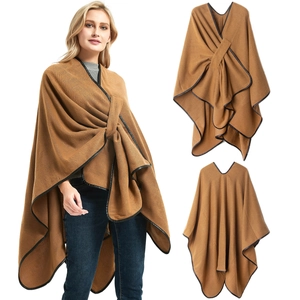 Women's camel knit shawl wrap with leather trim and buckle closure, front and back view