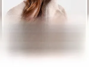 Macro shot of beige knitted winter hat showing detailed CrossHole Penetration texture