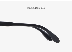 Detailed macro view of black curved temples on fashionable sunglasses with ergonomic design