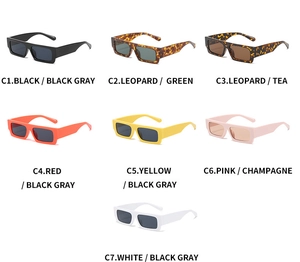Flat lay of retro square sunglasses in seven vibrant colors including leopard and red