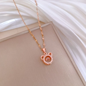 Luxurious rose gold titanium steel owl necklace with sparkling crystals and pink gemstone