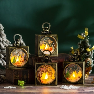 Retro Christmas lantern with LED warm light and festive snowman scene on table