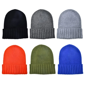 Minimalist knit beanies in six colors with classic ribbed texture and wide folded brim