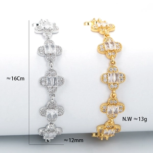 Elegant petal charm bracelet with sparkling zircons in gold and silver finishes