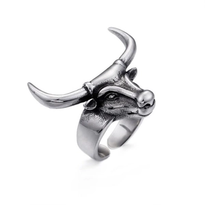 Detail of vintage bull head ring featuring blackened metal textures and adjustable band