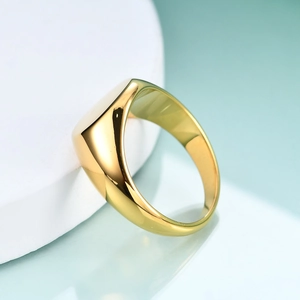 Polished 18K gold-plated signet ring for women featuring a minimalist round flat top