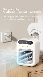 Detail view of mini USB air cooler top touch controls and matte ABS finish on desk