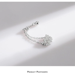 Detailed view of 925 silver wave chain ring with pave zircon stones and adjustable closure