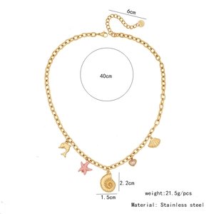 Detailed view of gold stainless steel ocean charms with specific size and weight labels