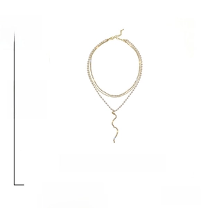 Close-up of layered gold necklace with pearls and rhinestones weighing 9.6g