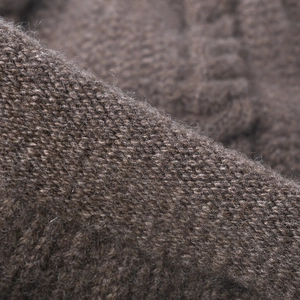 Stylish brown jacquard wool knit beanie for women showing premium texture and warm fabric