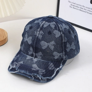 Vintage denim baseball cap with bowknot pattern and frayed edges for a casual look
