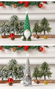 Detail of Christmas gnomes with green and grey knitted hats and long plush beards
