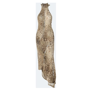 Detail of sexy leopard print maxi dress with halter neck and side slit with silver chains