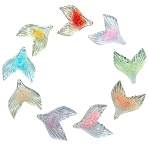 Colorful glitter resin mermaid tail charms for DIY necklaces arranged in a circle
