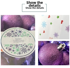 Detail of purple glitter Christmas bauble with festive greeting card and hanging cap