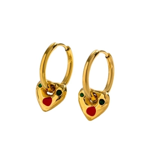 Golden heart drop earrings with red enamel and green accents in a minimalist design