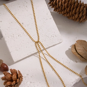 Elegant 304 stainless steel Y-shaped tassel beaded chain necklace on stone background