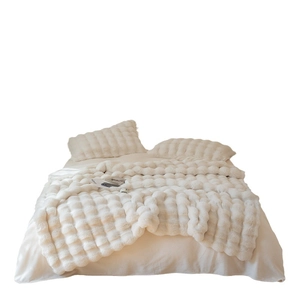 Luxurious cream faux rabbit fur bedding set with 3D waffle pattern blanket and shams