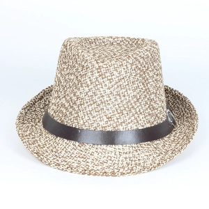 Detail of two-tone woven straw panama hat with brown leather band and metal buckle