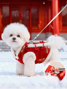 Detail of red Chinese New Year pet vest with silver D-ring leash attachment for dogs