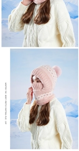 Detailed knit texture and soft pink fleece lining of integrated winter balaclava hood
