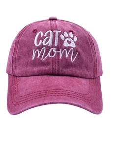 Close-up of white CAT mom embroidery and heart paw print on burgundy washed cotton cap