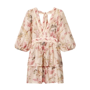 Floral print dress with deep V-neck, lantern sleeves and ruffle hem on white background