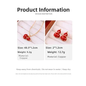 Detail view of 18k gold plated copper necklace and red gourd earrings set with dimensions