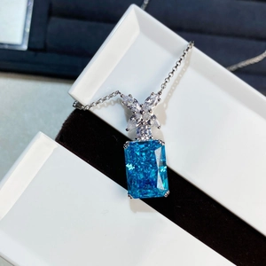 S925 sterling silver necklace with square blue ice-cut crystal pendant in a jewelry box