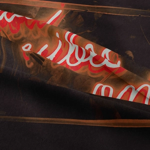 Detail of high-quality screen printing on dark gray cotton fabric tapestry with vivid textures