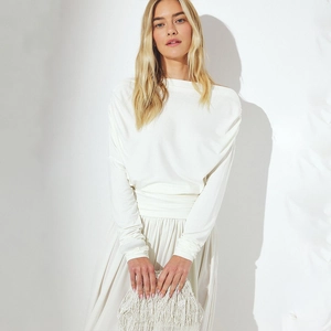 Elegant white off-shoulder long sleeve top with slim waist design and pleated skirt