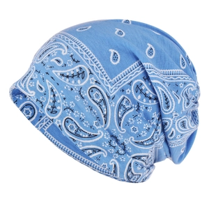 Close-up of light blue paisley pattern on soft breathable cotton beanie scarf