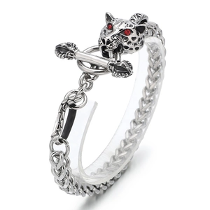 Mens vintage titanium steel bracelet featuring detailed leopard head with red zircon eyes