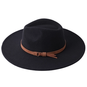 Detailed view of black wide brim wool felt fedora hat with brown leather band