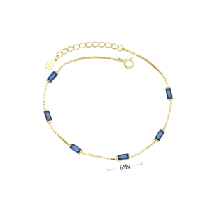 Detail view of 925 silver bracelet featuring 6mm baguette-cut deep blue gemstones