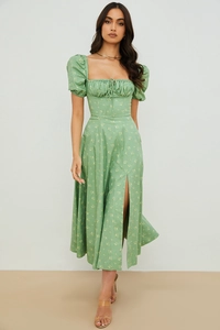 Detailed view of the side high slit design on this floral puff sleeve midi dress