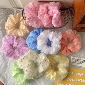 Luminous LED organza scrunchies in colorful macaron shades for hair styling