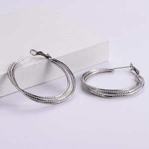 Minimalist silver multi-layer hoop earrings for women with a sleek triple-ring design