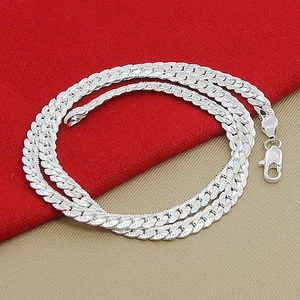 5mm silver curb chain necklace with a lobster clasp on a two-tone velvet background